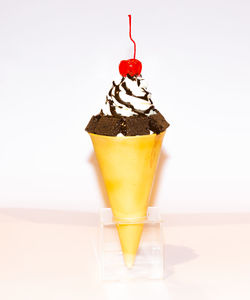 Close-up of drink against white background