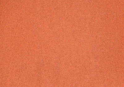 Full frame shot of textured orange background