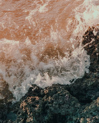 Full frame shot of rocks in sea