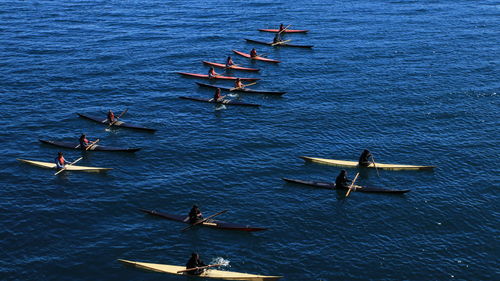 High angle view of people sailing in river