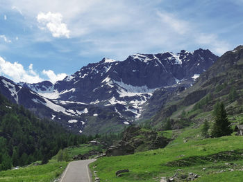 Scenic view of snowcapped mountains against sky