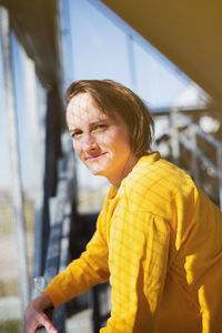 Portrait of smiling young man looking away