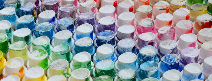 Full frame shot of multi colored spray paints for sale