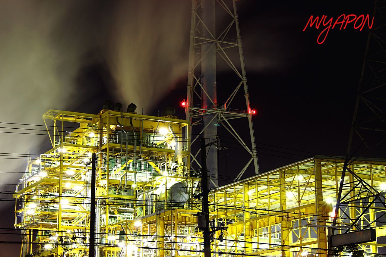 illuminated, night, built structure, architecture, building exterior, low angle view, sky, lighting equipment, electricity, outdoors, no people, connection, industry, construction site, metal, fuel and power generation, crane - construction machinery, dusk, city, street light