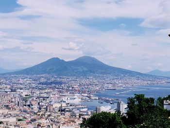 Cityscape with mountain range in background