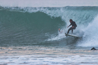 Man surfing in sea