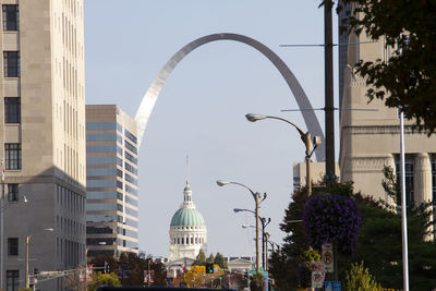 Buildings in city against sky