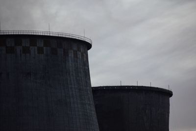 Low angle view of water tower against sky