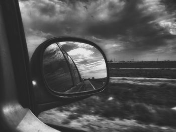 Reflection of cloudy sky on water