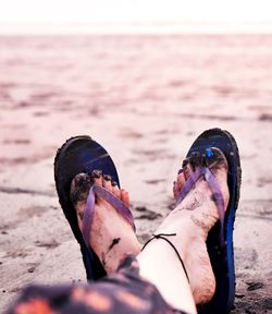 Low section of person on beach