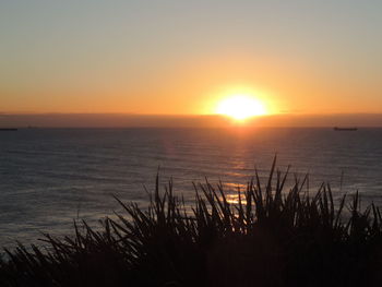 View of calm sea at sunset