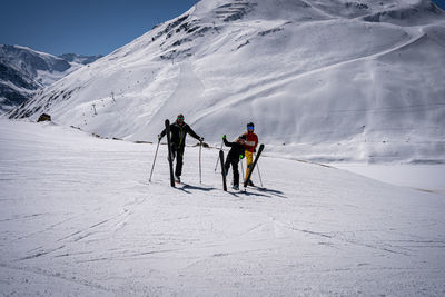 Father with 2 sons in ski trip in tirol, men's trip