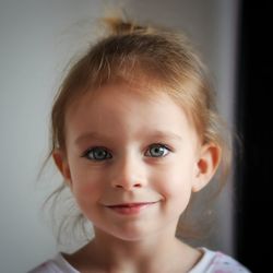 Portrait of cute girl at home