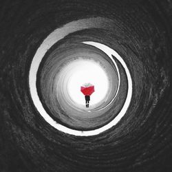 Man standing in tunnel