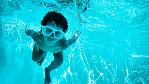 Young boy swimming