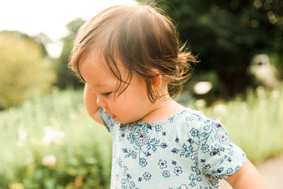 Girl standing outdoors