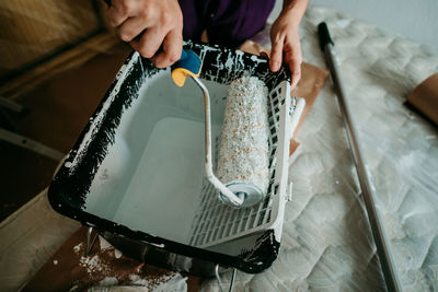 High angle view of man preparing food