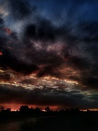 Scenic view of dramatic sky during sunset