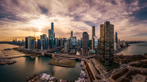 Panoramic view of buildings against sky during sunset