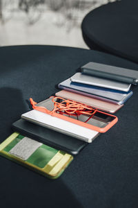 High angle view of mobile phones on table at office