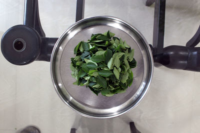 High angle view of vegetables in container on table