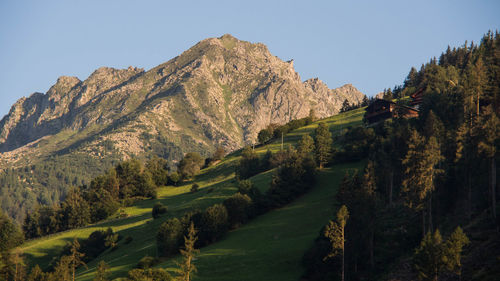 Panoramic view of landscape and mountains against clear sky