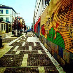 Multi colored city against sky