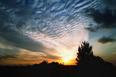 Scenic view of dramatic sky during sunset