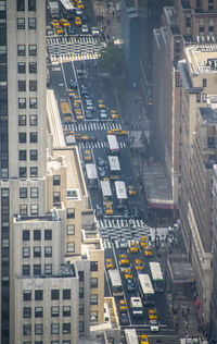 High angle view of vehicles on road in city