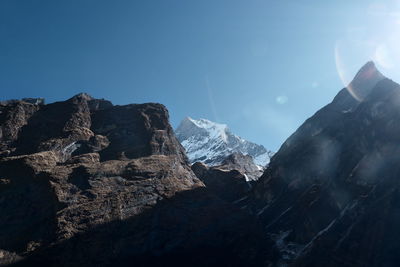 Scenic view of  snowcapped mountain machapuchare in nepal against clear sky