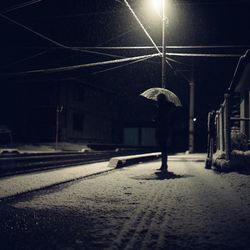 Illuminated street lights at night