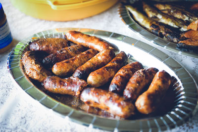 High angle view of meat in plate on table