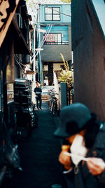 People walking on street in city