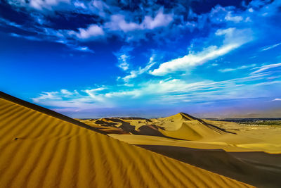 Scenic view of desert against sky