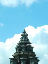 Low angle view of bell tower against sky