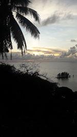 Scenic view of sea against sky at sunset