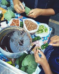 Midsection of woman preparing food