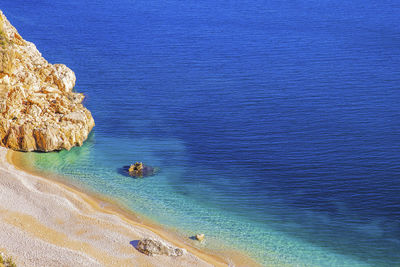 High angle view of rocks on beach