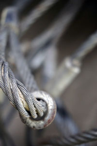 Close-up of rope tied on metal