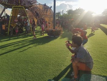 Rear view of people in park
