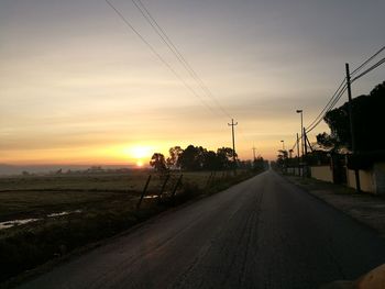 Road against sky during sunset
