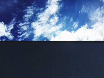 Low angle view of building against blue sky