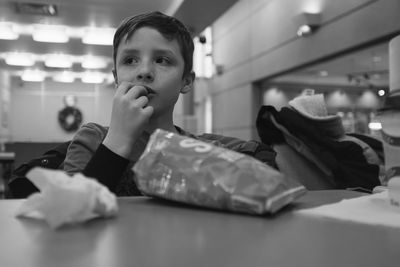 Boy having snacks at home