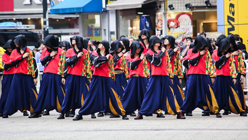 Group of people standing on street