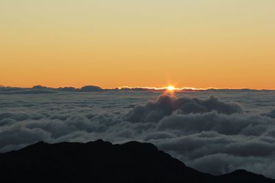 Scenic view of dramatic sky during sunset