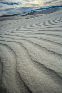 Tire tracks on sand dune