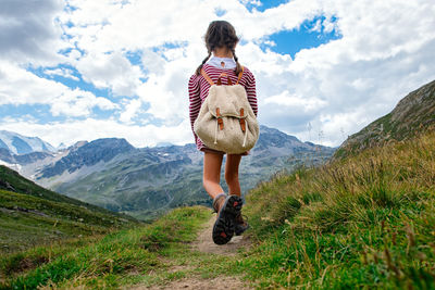 Full length of woman against mountains