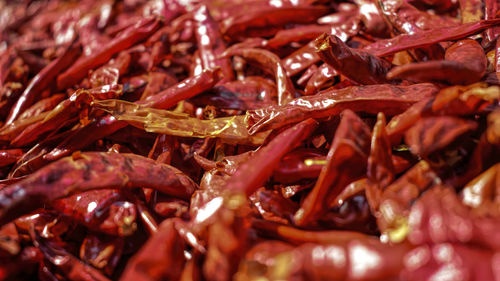 Full frame shot of red chili peppers for sale in market