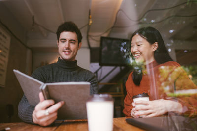 Business people working in cafe