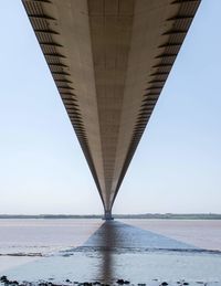 Low angle view of bridge over sea